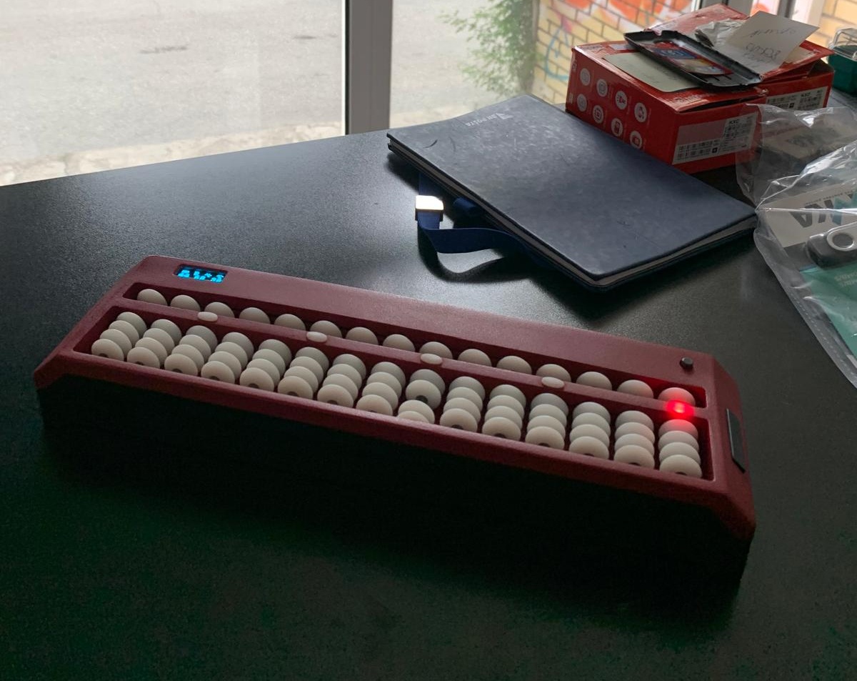 The Undugu smart abacus device